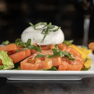 a plate of tomato salad