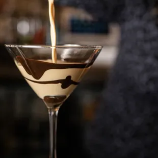 a martini being poured