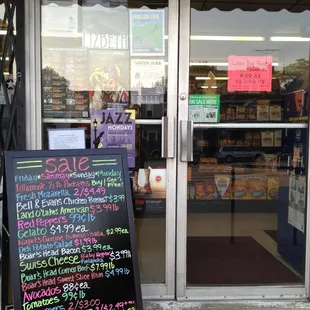 a blackboard sign in front of a store