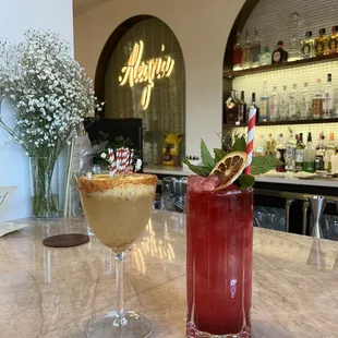 Margarita with passion fruit (left) Algeria Traveler (right)