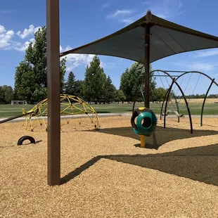 Seesaw, climbing dome, spinning, and shade!