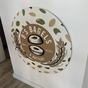 the logo on the wall