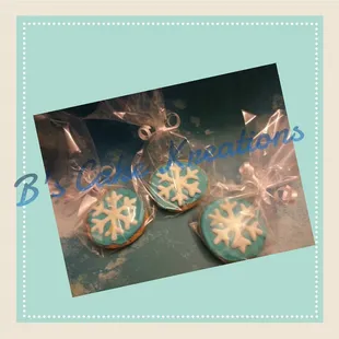 three decorated cookies