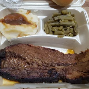 steak, mashed potatoes, and green beans