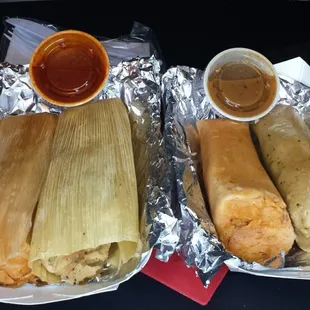 A couple tamales peeled and a couple more patiently waiting. Both sauces are spicy &amp; killer good!