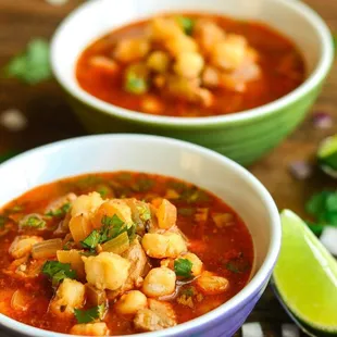 two bowls of soup on a table