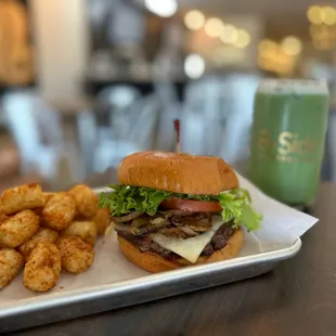 Mushroom and swiss burger with tots