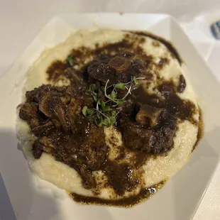 Oxtails and grits