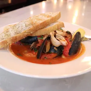 Seafood Cioppino
shrimp, mussels, clams, calamari, market fish &amp; blue crab, steamed in a spicy tomato brodetto