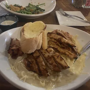 Chicken Alfredo, what&apos;s left of fried pickles, and Cobb salad.