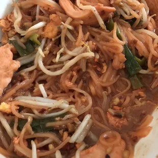 Bright pink Pad Thai with soggy overcooked noodles sitting in a pool of thick goopy sauce.