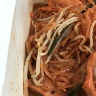 Bright pink Pad Thai with soggy overcooked noodles sitting in a pool of thick goopy sauce.