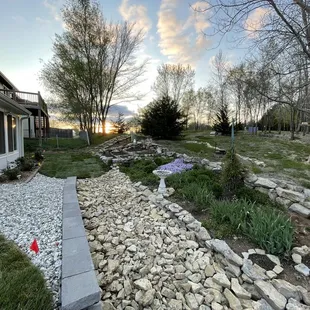 a garden with a gravel path