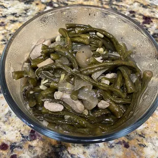 a bowl of green beans and chicken