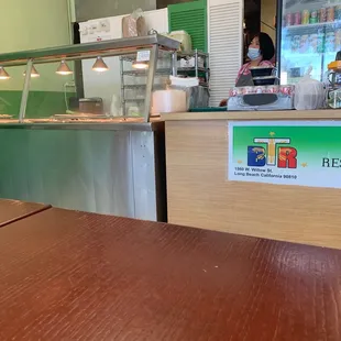 a woman behind the counter