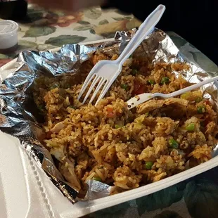 a plate of rice and vegetables