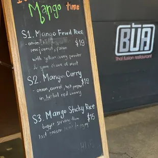a chalk board with a menu on it
