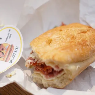 a sandwich and a cup of coffee