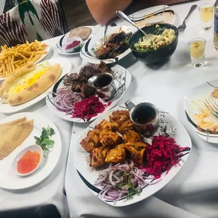 Red Caviar &amp; crepes, Chicken Kebab, Beef Kebab, Beef Tongue, Russian potato salad, French Fries, Adjarian Khachapuri