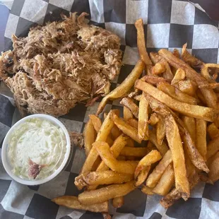 BBQ sandwich with a side of fries.  ramekin of coleslaw came with it.