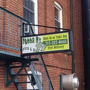 a sign on the side of a building