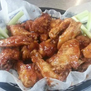 a plate of chicken wings