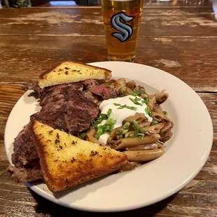 Steak stroganoff with toasty garlic bread