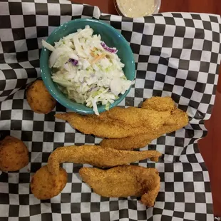 Regular fried catfish with hushpuppies and coleslaw.