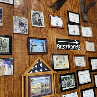 a wall full of plaques