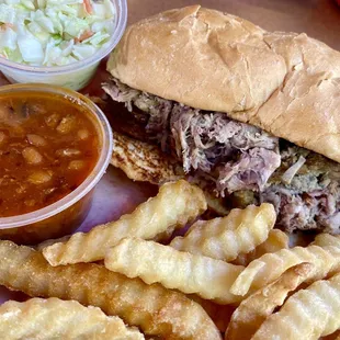 Pulled Pork Sandwich w/ beans, slaw &amp; fries