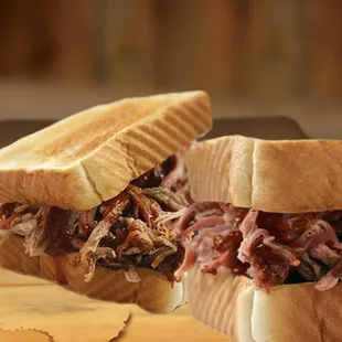 a pulled pork sandwich cut in half