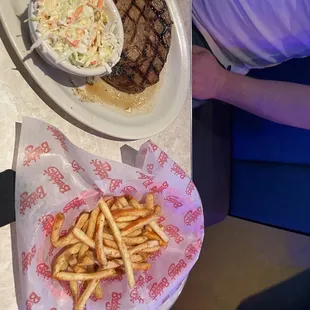 Spicy fries and Signature Steak. (Delish)
