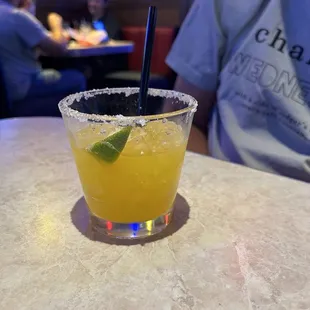 Mango Margarita on the rocks with a salt rim