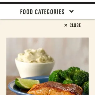 a plate of food with broccoli and mashed potatoes