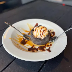a dessert with ice cream and caramel