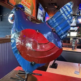 a blue and red chicken