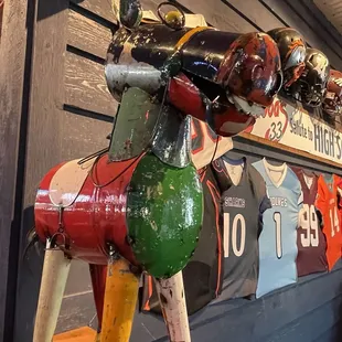a cow made out of beer bottles