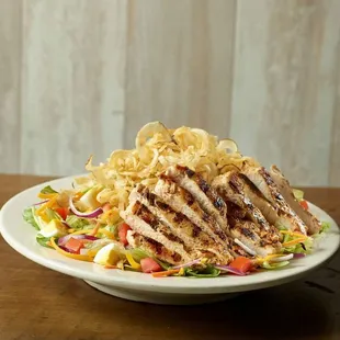 a chicken salad with chips