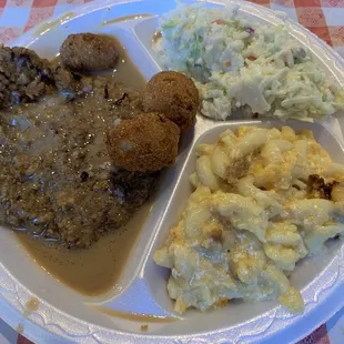 Country style steak (homemade), macaroni pie and southern slaw. I got the last steak at 2pm.