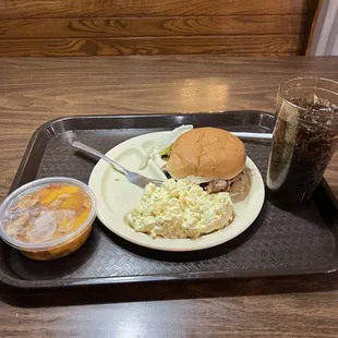 Pulled pork sandwich, Potato Salad, Homemade Peach Cobbler