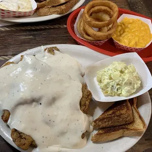 Double Chicken Fried Steak Dinner. Good onion rings and potato salad.