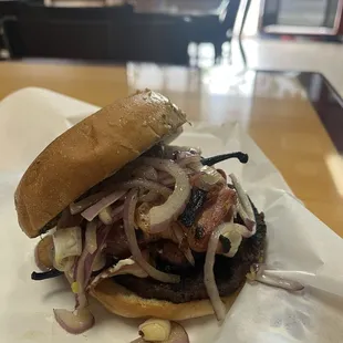 Bologna burger with cream cheese, bacon,  grilled onions, and grilled jalapeño!