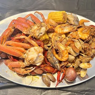 P2. 3 LB Seafood Plate - Shrimp/Clams/Mussel with Bubba Sauce and  P3. Snow Crab Plate: Snow Crab and 1LB Crawfish with Cajun sauce