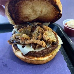 Amazing breaded mushrooms on the mushroom and swiss burger.