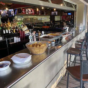 Direct bar access from the deck with a nacho bar.