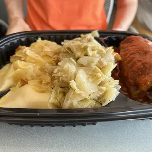 Polish platter of (l-r) pierogies, haluski and cabbage roll