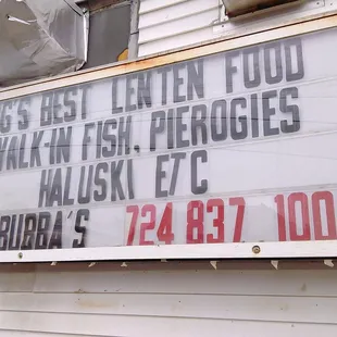 a sign on the side of a building