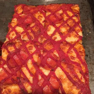 Sauce on top- yummy cheesy crust.