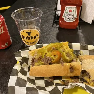 Cheese steak with whiz, fried onion, and cherry pepper
