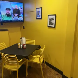 a table and chairs in a restaurant